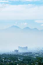 Beautiful cityscape on misty Bandung city