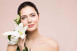 Woman Beauty Natural Makeup Portrait with Lily Flower, Happy Girl Face Skin Care and Treatment