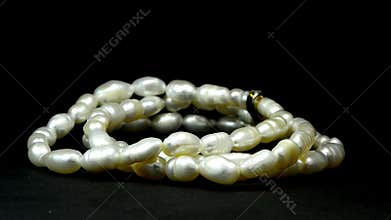 Pearl bracelet on turn table