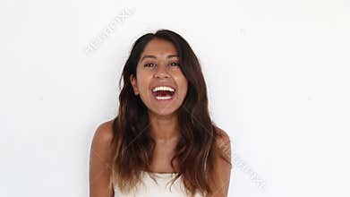 Close up portrait of millennial attractive woman smiling.