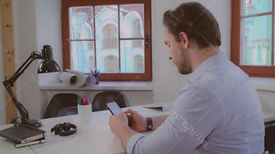 Adult businessman use mobile phone