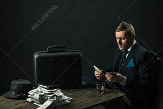 Man in suit. Mafia. Making money. Money transaction. Businessman work in accountant office. Small business concept