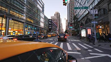 New York, USA, September 2018: Riding in the evening in New York in the famous yellow cab