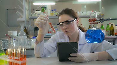 Portrait woman doctor check results test in laboratory.