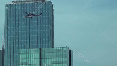 Helicopter taking off from the top of a skyscraper, istanbul, Turkey