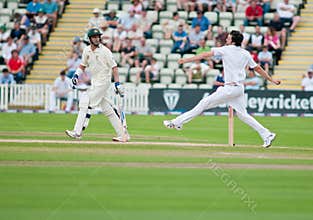 Graham Onions with Michael Hussey looking on