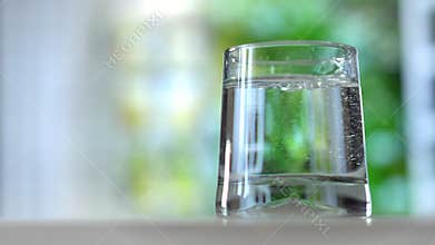 Close-up pouring purified fresh drink water from the bottle on summer background