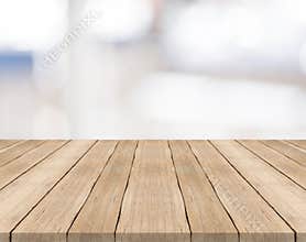 Empty wood table top on white blurred background