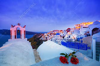 Bell tower of an orthodox church at Santorini, Greece. Honeymoon summer aegean cycladic background.