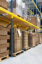 Shelves with cartons in warehouse