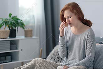 Sick woman with high fever