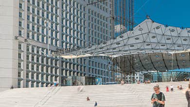 The Grande Arche with stairs timelapse in the La Defence business district of Paris, France.