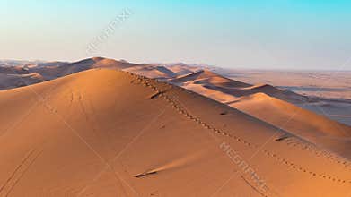 Panorama on colorful sand dunes and scenic landscape in the Namib desert, Namib Naukluft National Park, tourist destination in Nam