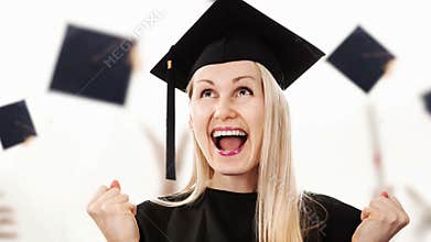 Graduation - happy student wearing gown and cap