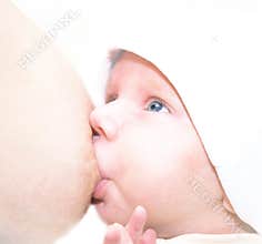 Breast-feeding of cute newborn baby