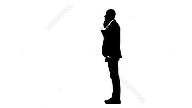 Man rejoices in the victory and speaks on the phone. White background. Silhouette