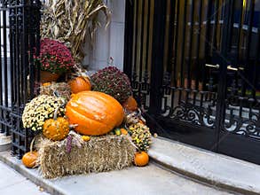Halloween composition at the entrance of a luxury building