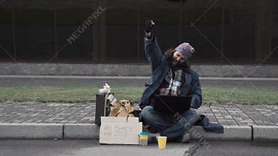 Funny homeless beggar winning a fortune online