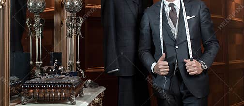 Tailor hands expensive tailoring individual suits