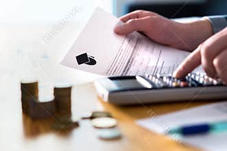 Man counting college savings fund, tuition fee or student loan.