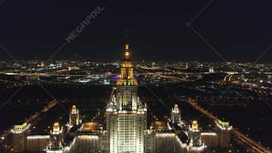 Moscow State University and Illuminated Moscow Skyline at Night. Russia. Aerial View
