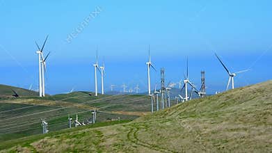 Windmills turning in the breeze