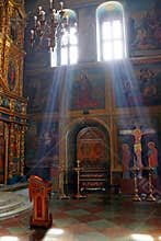 Morning lighted old church, bible, Jesus on cross.