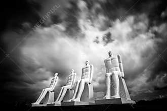 The sculpture `Men at sea` monochrome