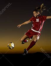 Female Soccer Player About to Kick the Ball