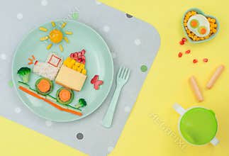 Car from rice, sandwich and fresh fruits and vegetables on the y