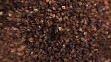 Coffee beans jumping in super slow motion 4K