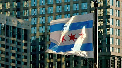 Cinematic Chicago flag waving at sunset