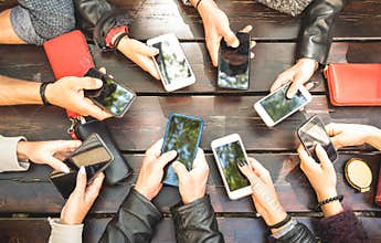 People group having addicted fun together using smartphones - De