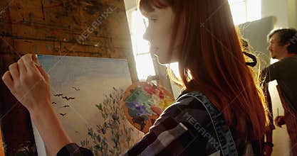 Confident artist painting on canvas 4k