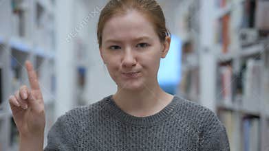 Portrait of Young Woman Waving Finger to Refuse, No