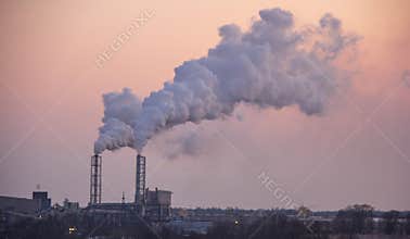 Chimney smoking stack. Air pollution and climate change theme.