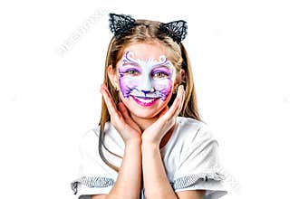 Portrait of teen girl with cat face painting