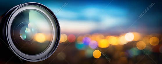Camera lens with lens reflections. Media and technology concept background.