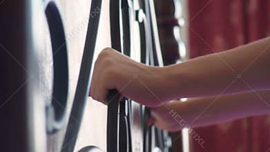 Women`s hands clinging to the forged head of the bed. forged beds, details. 4k, slow motion.