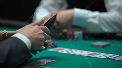 Business person betting all chips and money, risky poker game, bluff gambling
