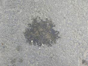 Gray color asphalt road background with spot in center