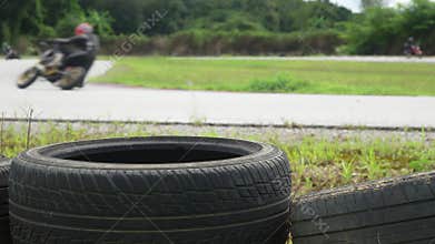 Motorcycle practice leaning into a fast corner on track