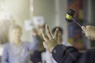 Female auction control Hold the 3rd hand and point the hammer bid winner.