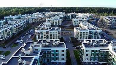 Aerial panorama on small town in North Europe, modern buildings rooftops.