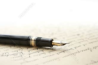 Gold Pen with Letter and Writing