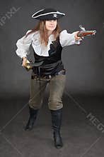 Woman in a costume of sea pirate attack