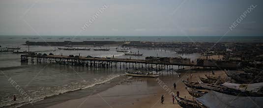 Panoramic view to Accra beach with the fishermans boat, Ghana
