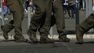 Men in military uniform cordon off building, threat of terrorist act, slow-mo