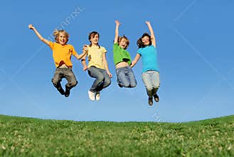 Happy teenagers jumping