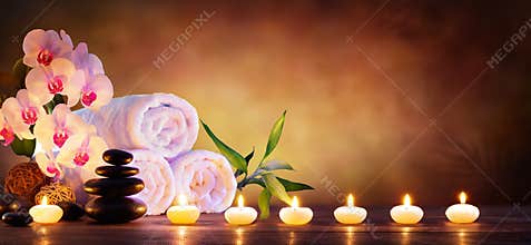 Spa Concept - Massage Stones With Towels And Candles
